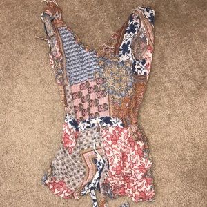 Zara romper can be worn front or back